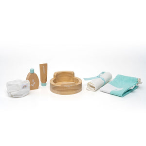 wooden doll care toy set by Miniland